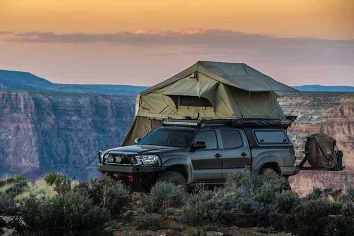 Tent with outlet built in bed